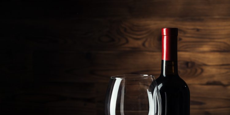 Red wine on an oak barrel